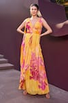 Shop_Mandira Wirk_Yellow Lurex Georgette Print Floral Plunging V Neck Glittery Striped Maxi Dress _Online_at_Aza_Fashions