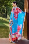 Shop_Mandira Wirk_Blue Viscose Crepe Printed Vibrant Floral V Neck Kaftan _at_Aza_Fashions