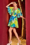 Shop_Mandira Wirk_Green Viscose Crepe Printed Abstract Sweetheart Neck Romper Dress _Online_at_Aza_Fashions