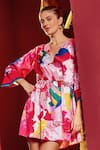 Mandira Wirk_Red Satin Printed Abstract Floral V Neck Romper Dress _at_Aza_Fashions