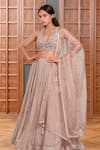 Buy_Samyukta Singhania_Beige Silk Embroidery Sequin Halter Neck Peony Bloom Lehenga Set _at_Aza_Fashions