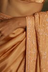 Kavitha Gutta_Peach Pure Satin Embroidery Sequin Plunge Glimmer Floral Saree With Blouse _Online_at_Aza_Fashions