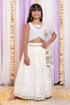 Buy_Free Sparrow_Ivory Net Embroidery Sequin Unicorn Lehenga And One Shoulder Top Set _at_Aza_Fashions