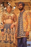 The Royaleum_Blue Blouse Net Hand Embroidery Floral Illusion Neck Lehenga And Set _Online_at_Aza_Fashions