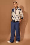 Shop_Vivek Karunakaran_Blue Voile Printed Crackle Bomber Jacket _at_Aza_Fashions