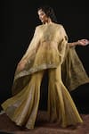 Buy_Reeti Arneja_Gold Organza Embroidery Ambrosia Boat Neck Asymmetric Cape And Godet Sharara Set 