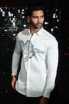 Sanjana reddy Designs_White Stretchable Cotton Embroidery Kingfisher Mighty Rise Cutdana Shirt _Online_at_Aza_Fashions