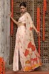 Buy_Gazab by Miku Kumar_Peach Muslin Printed Floral Bustier Plunge Levi Draped Skirt Set With Cape _Online_at_Aza_Fashions