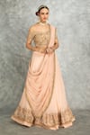 Tanu Malhotra_Peach Blouse Net Embroidery Sequins Off Shoulder Floral Lehenga Set _at_Aza_Fashions