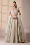 Buy_Chaashni by Maansi and Ketan_White Net Embroidered Resham Sweetheart Tassel Lehenga Set _at_Aza_Fashions