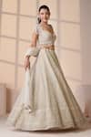 Buy_Chaashni by Maansi and Ketan_White Net Embroidered Resham Sweetheart Tassel Lehenga Set 