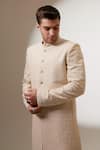 BUBBER COUTURE_Cream Chaniya Silk Embroidery Stellar Lorenzo Sherwani Jacket _at_Aza_Fashions