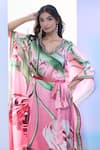 Pria Kataria Puri_Red Satin Printed Tulip Wavy V-neck Kaftan _at_Aza_Fashions