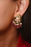 Buy_Vasundhara_Gold Plated Artificial Kundan Ekta Paisley Earrings _at_Aza_Fashions