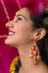 Buy_Manner_Pink Enamel Phool Dangler Earrings _at_Aza_Fashions