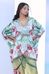 Pria Kataria Puri_Blue Satin Printed Tulip V-neck Sequined Tunic _Online_at_Aza_Fashions