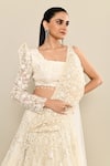 Buy_Kalighata_Ivory Net Embroidery Floral Asymmetric Neck Sea Noor Lehenga And Blouse Set 