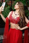 Foram Patel_Red Georgette Hand Border Work Ruffle Pre-draped Skirt Saree With Blouse _at_Aza_Fashions