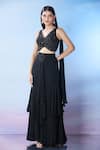 Buy_Samyukta Singhania_Black Blouse Net Embroidered Sequin Blunt V Brooch Layered Skirt Set _at_Aza_Fashions