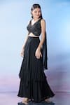 Shop_Samyukta Singhania_Black Blouse Net Embroidered Sequin Blunt V Brooch Layered Skirt Set _Online_at_Aza_Fashions