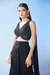 Samyukta Singhania_Black Blouse Net Embroidered Sequin Blunt V Brooch Layered Skirt Set _at_Aza_Fashions