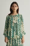 Shop_KoAi_Green Georgette Print Chevron Round Neck Top _Online_at_Aza_Fashions