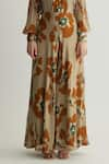 Shop_KoAi_Beige Chiffon Print Floral Flared Pant _Online_at_Aza_Fashions