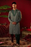 Buy_Pooja Bagaria_Green Cotton Print Ajrakh Eclipse Kurta With Dual Toned Draped Dhoti Pant _at_Aza_Fashions