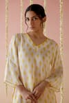 Shop_Nero India_Yellow Cupro Satin Print Floral V Neck Butti Kurta And Pant Set _at_Aza_Fashions