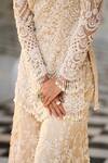 Buy_Seema Gujral_Beige Net Embroidered Pearl V-neck Cutwork Kurta Sharara Set _Online_at_Aza_Fashions