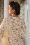 Seema Gujral_Beige Net Embroidered Pearl V-neck Cutwork Kurta Sharara Set _at_Aza_Fashions