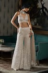 Buy_Seema Gujral_Cream Net Embroidered Crystal Halter Floral Cutwork Blouse Boot-cut Pant Set _at_Aza_Fashions