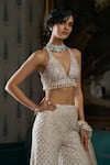 Buy_Seema Gujral_Cream Net Embroidered Crystal Halter Floral Cutwork Blouse Boot-cut Pant Set _Online_at_Aza_Fashions