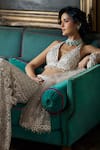 Buy_Seema Gujral_Cream Net Embroidered Crystal Halter Floral Cutwork Blouse Boot-cut Pant Set 