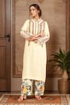 Buy_Debyani + Co_Ivory Embroidered Rose Round Thread Straight Kurta With Pant _at_Aza_Fashions