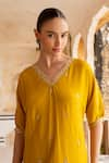 Buy_KARAJ JAIPUR_Yellow Dola Silk Embroidery Mirror V-neck Zari Asymmetric Kurta With Pant _Online_at_Aza_Fashions