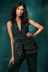 Shop_Sawan Gandhi_Green Georgette Net Embellished Bead Tasselled Peplum Jacket With Flared Pant _at_Aza_Fashions