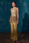 Buy_Sawan Gandhi_Gold Net Satin Embellished Tasselled Sequined Peplum Jacket With Flared Pant _at_Aza_Fashions