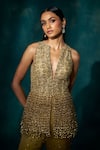 Shop_Sawan Gandhi_Gold Net Satin Embellished Tasselled Sequined Peplum Jacket With Flared Pant _at_Aza_Fashions