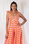 Lavina sippy_Orange Silk Print Chevron Sweetheart Neck Pattern Jumpsuit _Online_at_Aza_Fashions