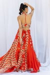 Shop_Lavina sippy_Orange Silk Embellished Mirror Halter Neck Patchwork Lehenga With Blouse _at_Aza_Fashions