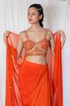 Lavina sippy_Orange Crepe Embroidered Mirror Blouse Sweetheart Draped Skirt Set With Cape _at_Aza_Fashions