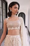 Buy_Charu and Vasundhara_Ivory Tafetta Tussar Net Embroidered Sequin Square Felix Fischcut Lehenga Set _Online_at_Aza_Fashions