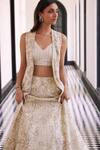 Shop_Charu and Vasundhara_Ivory Tafetta Tussar Net Embroidered Bead V Neck Flavia Waistcoat And Lehenga Set _Online_at_Aza_Fashions