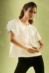 Samyukta Singhania_White Neoprene Lycra Plain Round Neck Asymmetric Ruffled Sleeves Top _at_Aza_Fashions