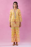 Kunwaraniritu_Yellow Georgette Embroidery Mirror Plunge V Neck Kurta And Pant Set _at_Aza_Fashions