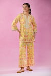 Buy_Kunwaraniritu_Yellow Georgette Embroidery Mirror Notched Short Kurta And Pant Set _at_Aza_Fashions