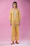 Kunwaraniritu_Yellow Georgette Embroidery Mirror Notched Short Kurta And Pant Set _Online_at_Aza_Fashions