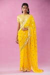 Buy_Kunwaraniritu_Yellow Georgette Embroidery Sequin Boat Neck Polka Dot Saree With Blouse _at_Aza_Fashions