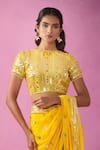 Shop_Kunwaraniritu_Yellow Georgette Embroidery Sequin Boat Neck Polka Dot Saree With Blouse _Online_at_Aza_Fashions